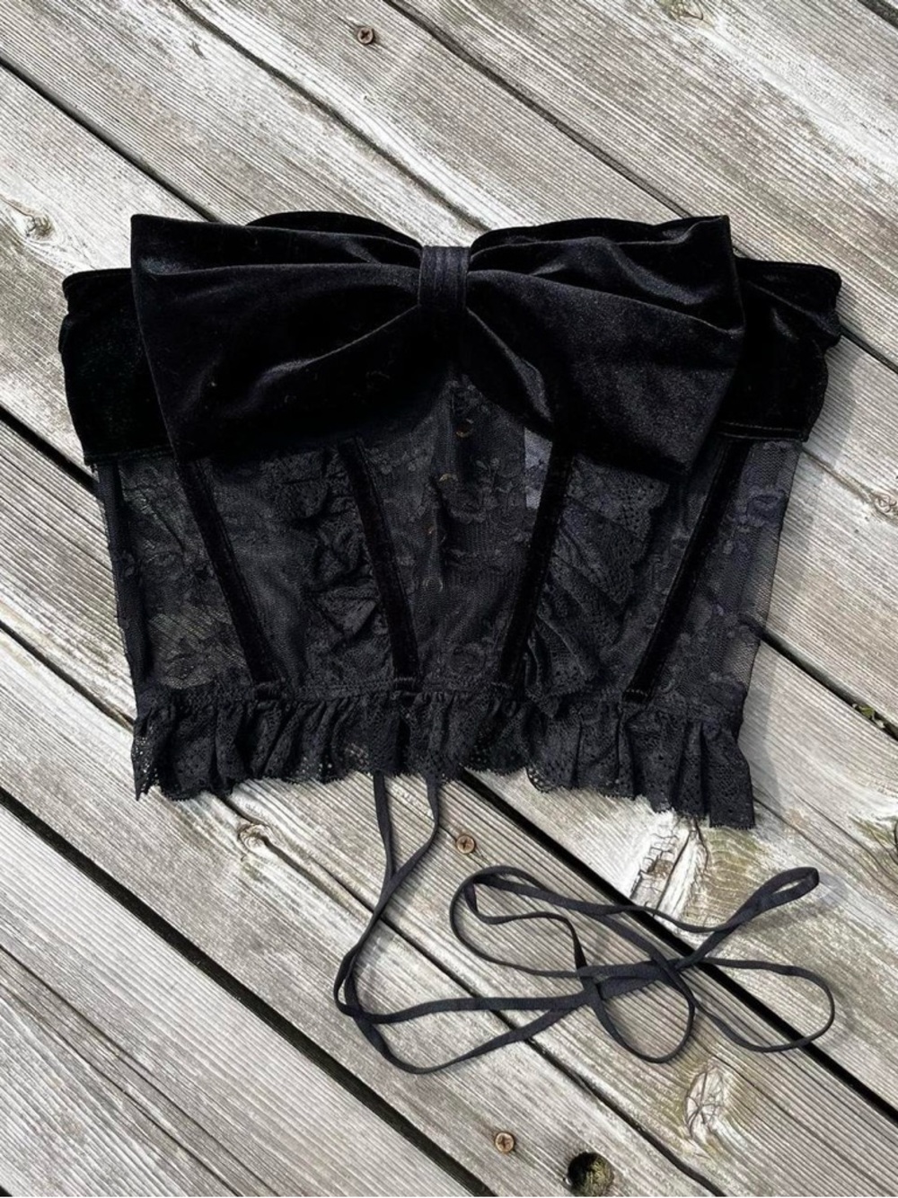 Urban Outfitters black lace corset with velvet bow